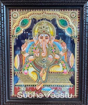 Arranging Lord Ganesha Photo on Entrance door