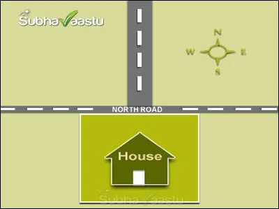House with a narrow North road and a direct North street focus showing stronger Vastu impact