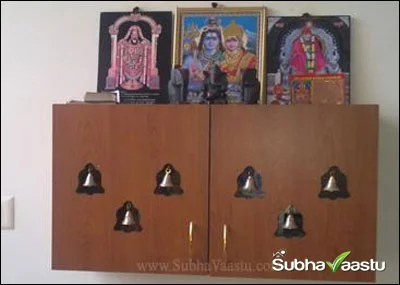 Pooja God Idots above Shelve