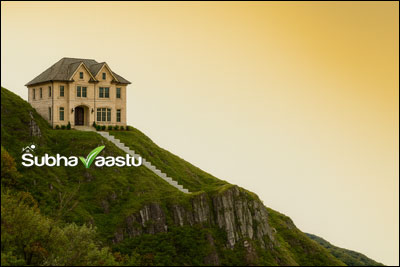Vastu guidance for house construction on hilltop with slope towards East
